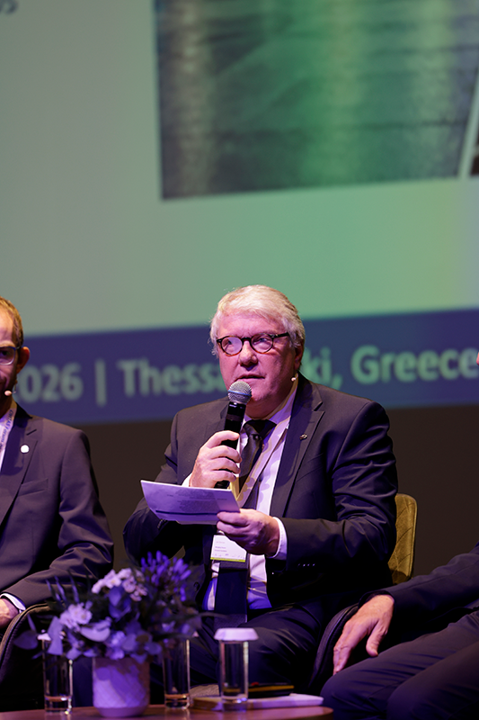 Jan Deman of Busworld speaking during the panel discussion on coach tourism and urban mobility at CIVITAS 2026 in Thessaloniki, Greece